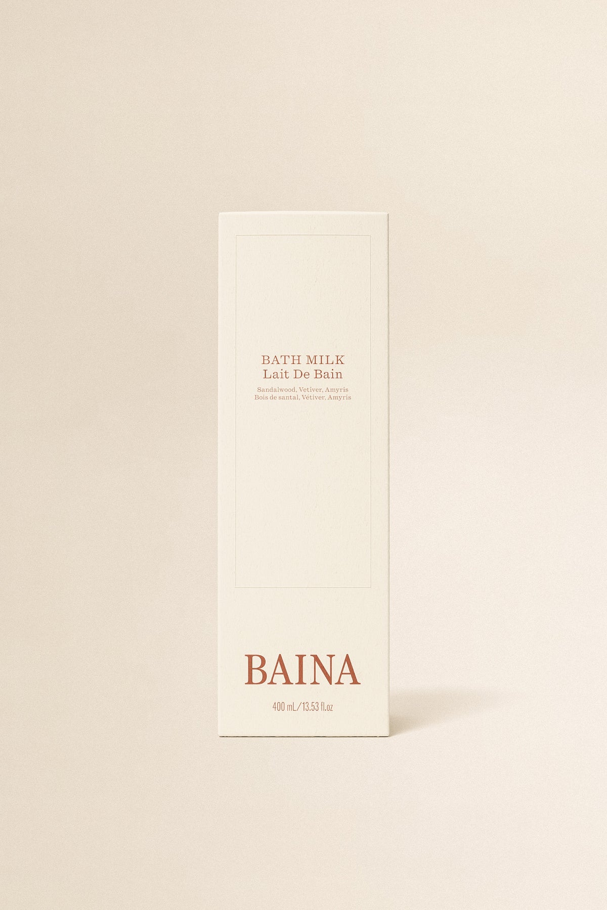 BAINA Bath Milk body wash in a white bottle with a pump dispenser, featuring soft pastel packaging and natural skincare branding.