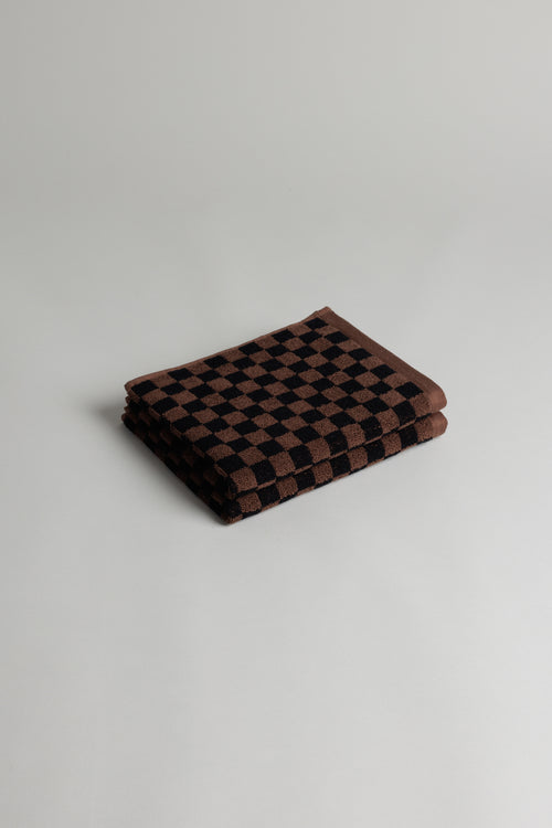 Baina Josephine hand towel in Tabac and Noir, soft fabric with elegant striped design, suitable for bathroom or kitchen use.
