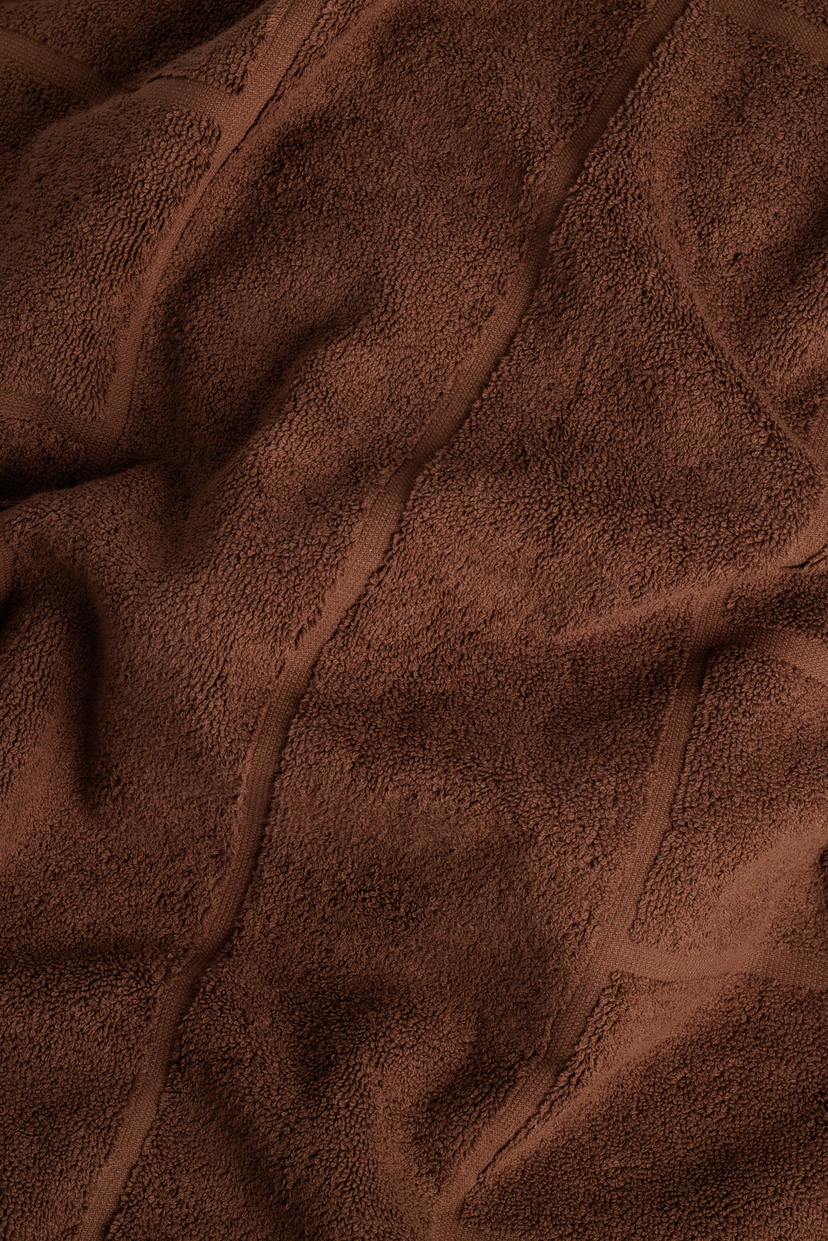 Greenwich bath towel in Tabac by BAINA, showing soft, plush fabric with a textured weave for luxurious comfort.