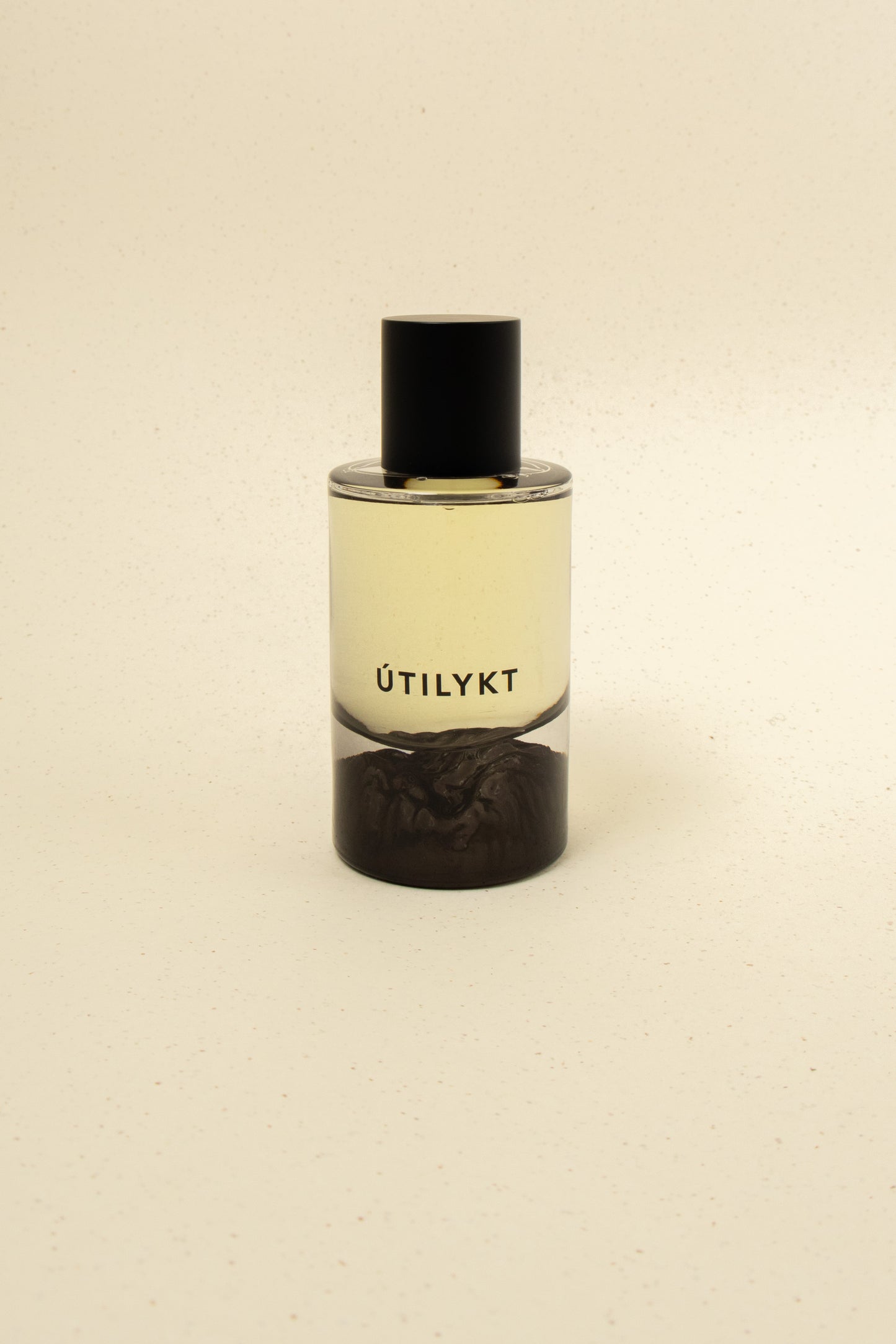 Fischersund Útilykt perfume bottle with elegant design, showcasing the luxurious fragrance container on a neutral background.