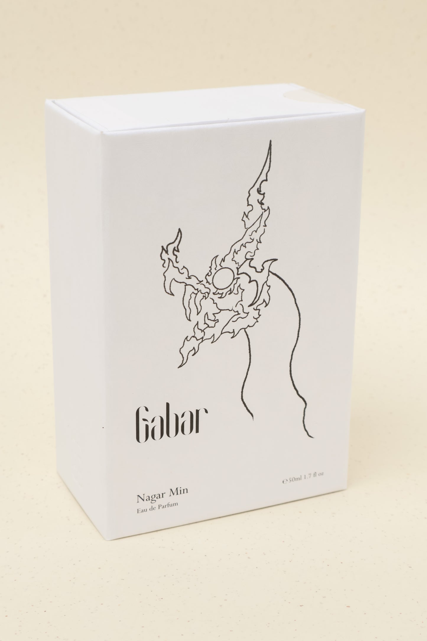 White perfume box with black line art and text Gabar Nagar Min Eau de Parfum 50ml