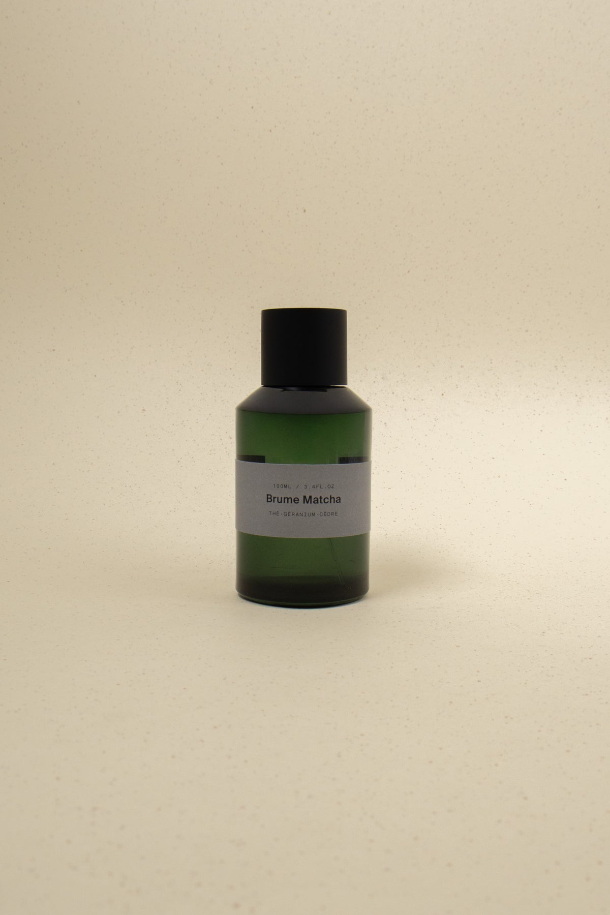 MarieJeanne Brume Matcha perfume bottle with green accents, showcasing elegant packaging and a fresh, botanical scent.