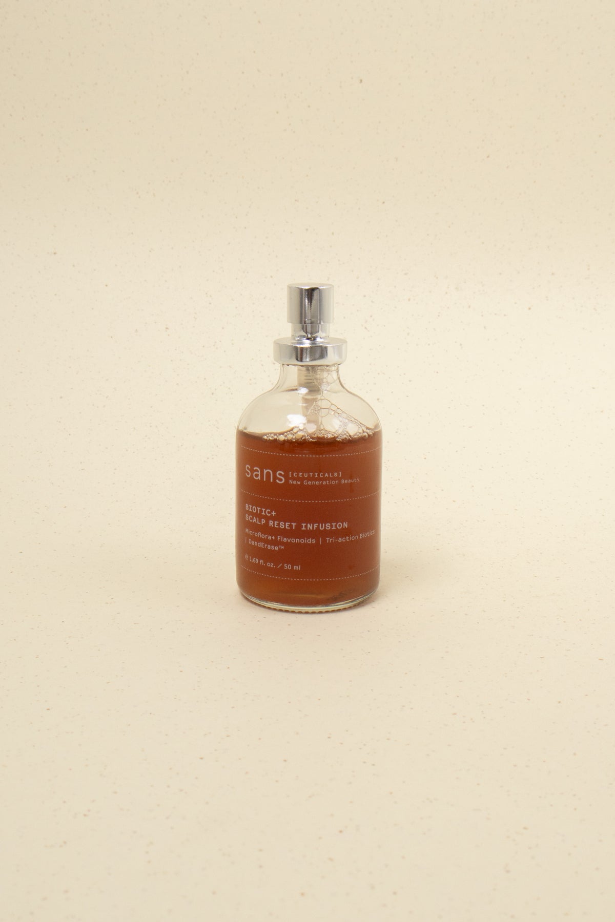 Sans [ceuticals] Biotic+ Scalp Reset Infusion hair treatment bottle with applicator tip, designed to soothe and balance the scalp.