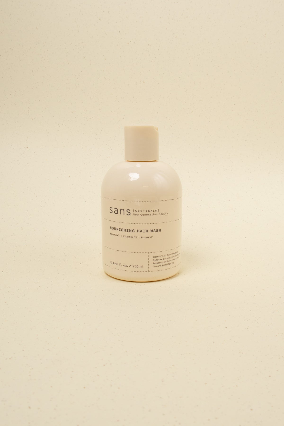 Sans ceuticals Nourishing Hair Wash shampoo bottle with label, showing a nourishing hair care product in a sleek container.