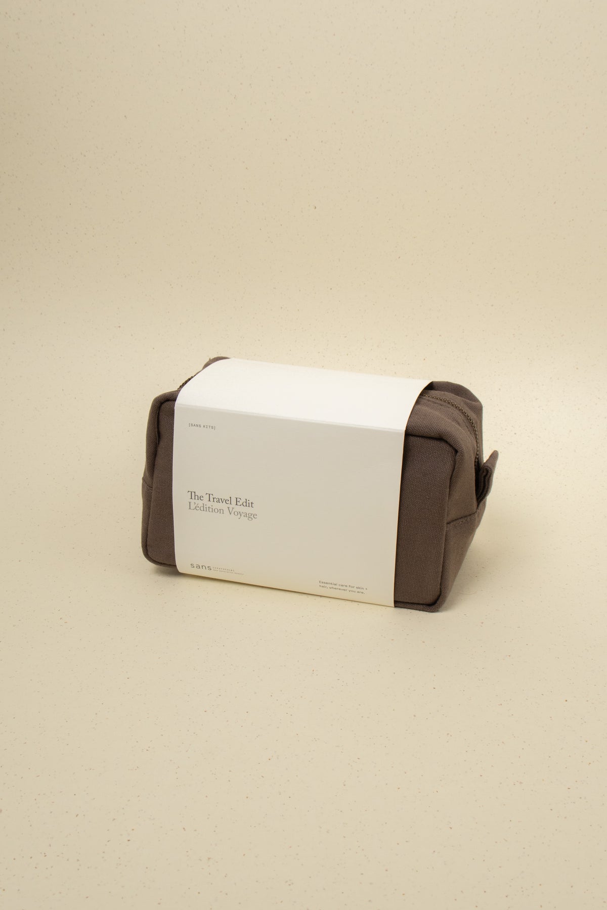 Sans [ceuticals] The Travel Edit skincare set with multiple small bottles and containers suitable for travel.