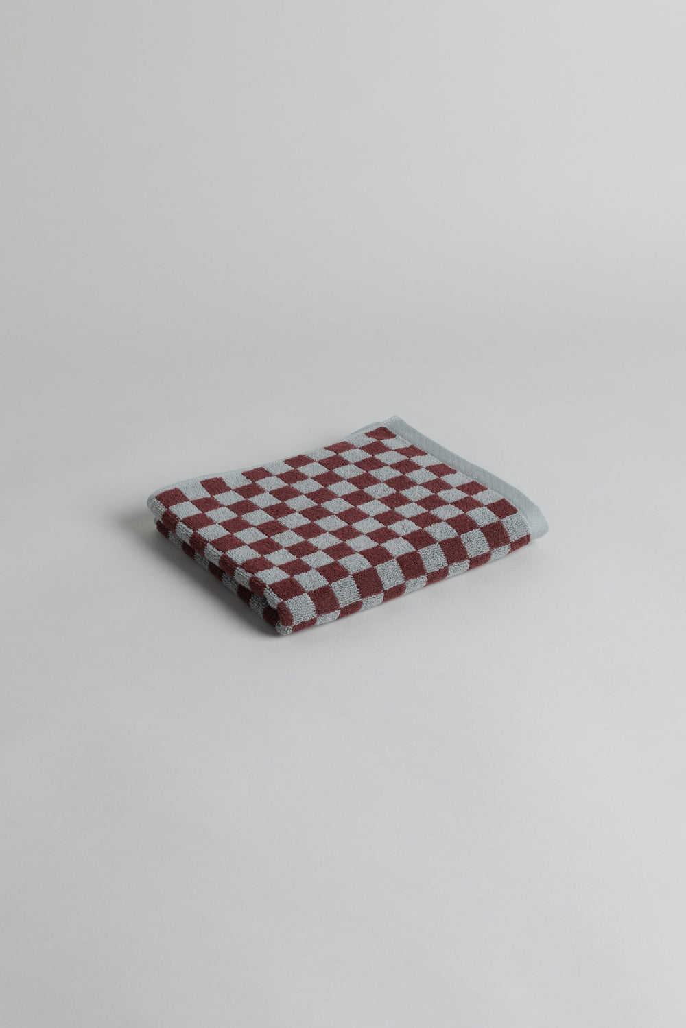 Baina Josephine hand towel in Cement and Rhus design, featuring soft fabric and decorative pattern for bathroom or kitchen use.