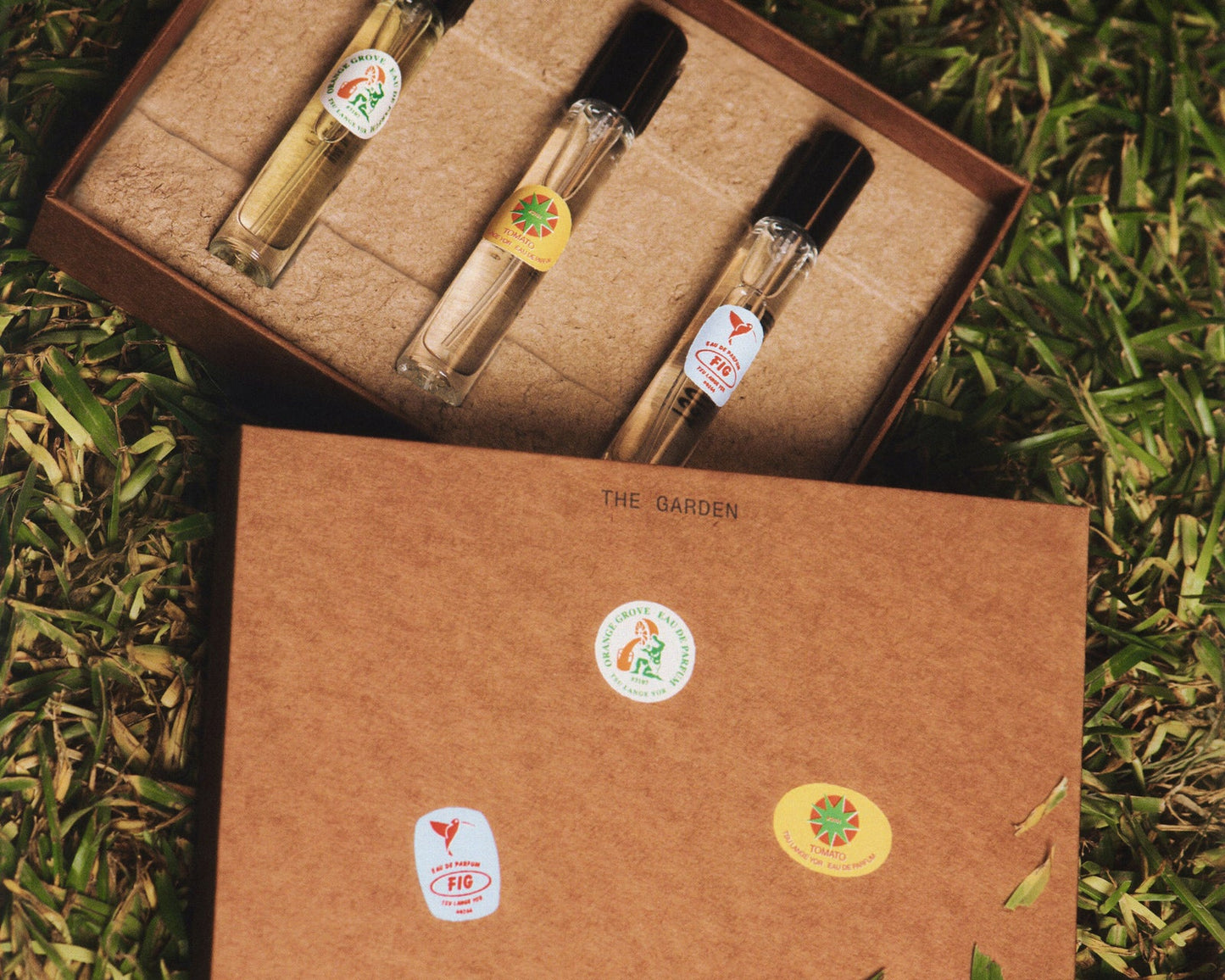 Tsu Lange Yor The Garden perfume bottle with floral design and elegant packaging, showcasing a luxurious fragrance.