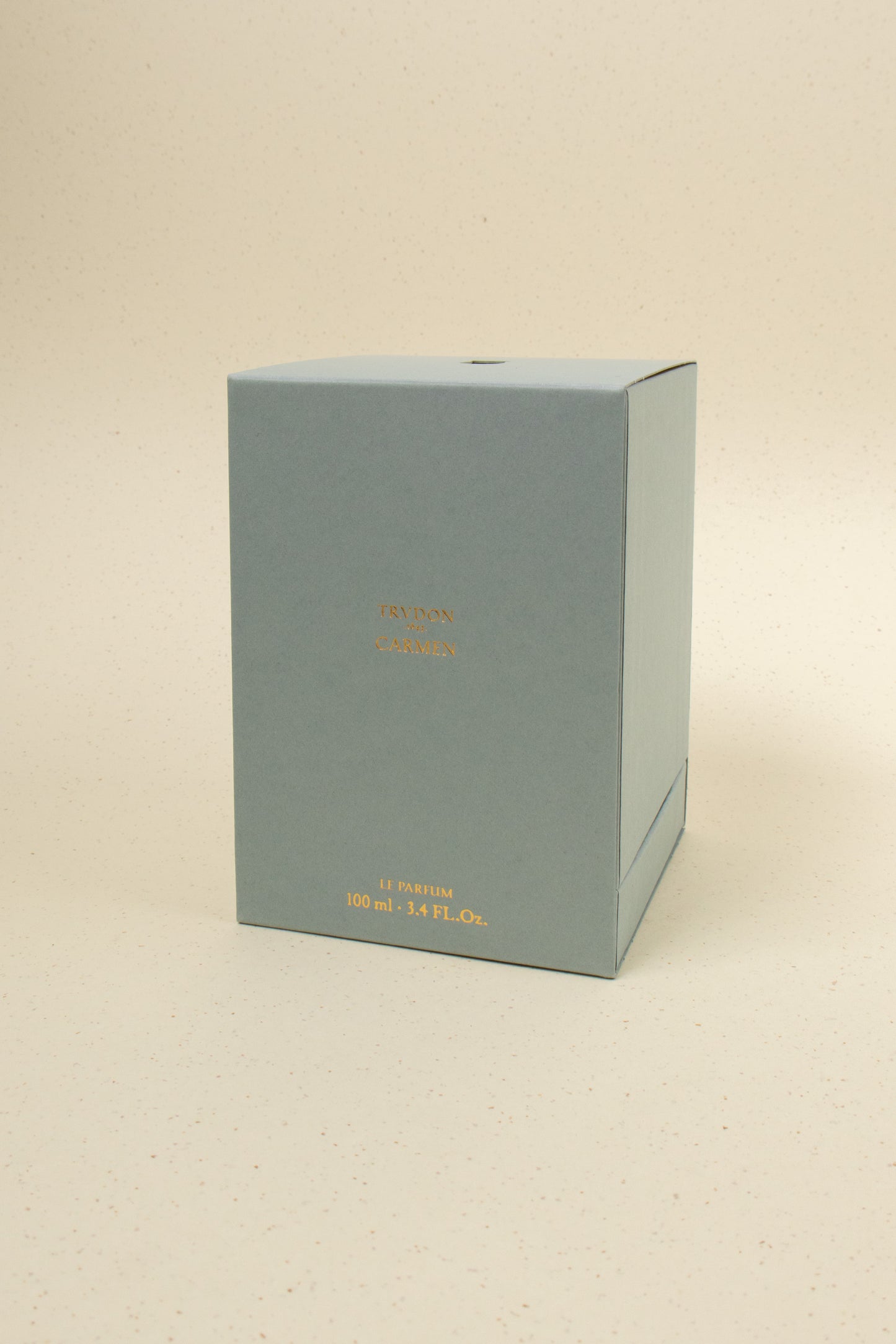 Trudon Carmen perfume bottle with elegant design, showcasing the luxurious fragrance packaging and branding.