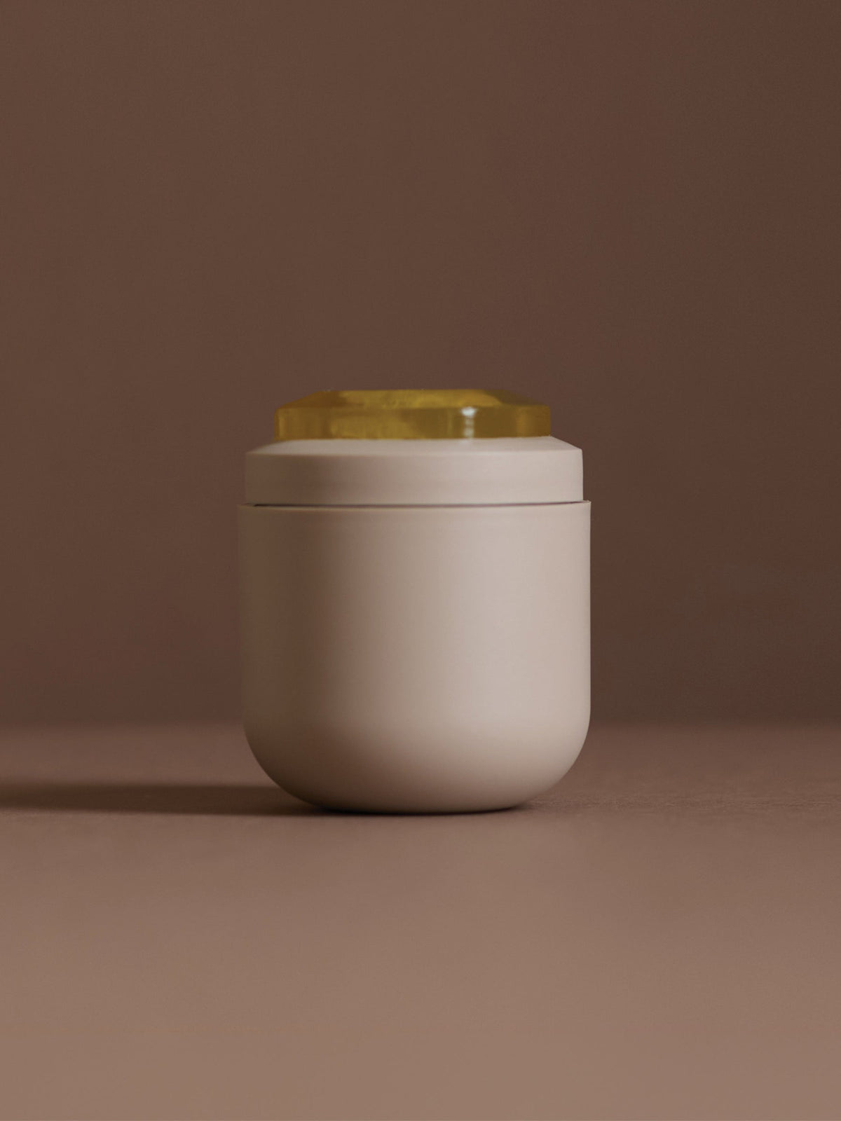 Sans [ceuticals] Perpetual Activator 7 body, hair, and face oil kit in a sleek bottle, designed for nourishing and revitalizing skin and hair.