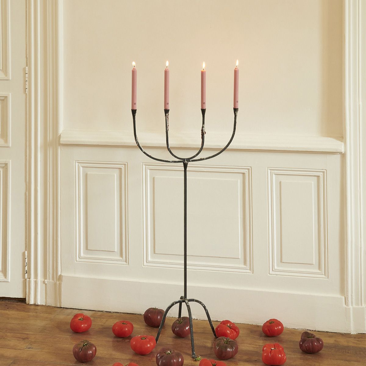 Set of six Carrière Frères tomato-scented taper candles with natural wax finish and elegant tapered design.
